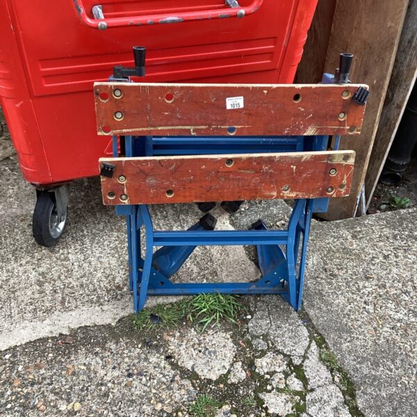 Vintage Workmate bench with vice, ideal for DIY projects.