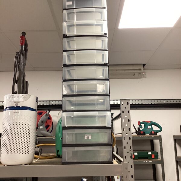 Eleven-tier clear plastic storage unit for organization.
