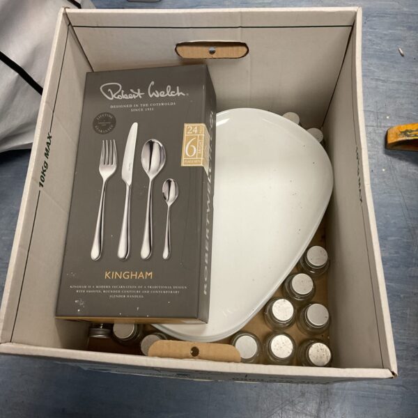 Unopened Robert Welch cutlery set in original packaging.