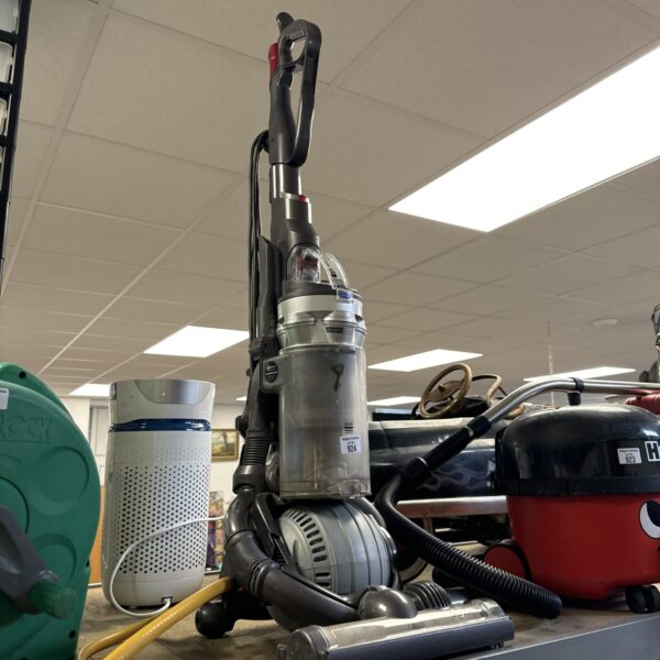 Used Dyson Ball vacuum cleaner in a home setting.