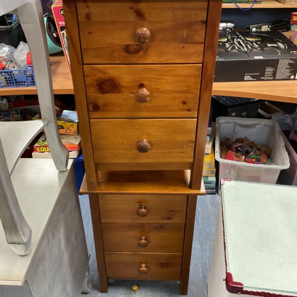 Pair of vintage wooden bedside cabinets with three drawers.