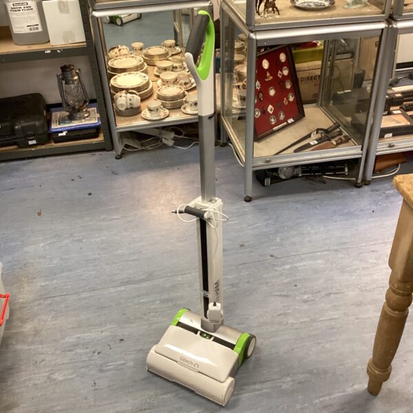 Gtech AirRam MK2 cordless vacuum cleaner in a home setting.