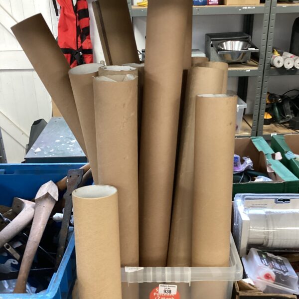 Assorted postage tubes in a cardboard box, ideal for mailing.