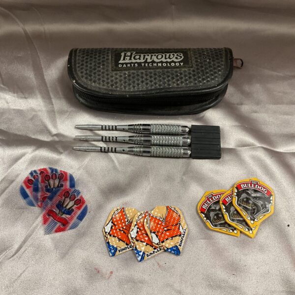 Harrows darts set in case with spare flights.