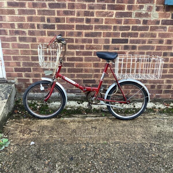 Vintage Universal Folding Bike with front basket.