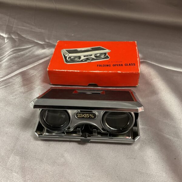 Vintage 25x24 folding opera glasses in original box.
