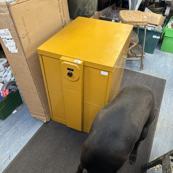 Vintage metal filing cabinet with lock, two drawers, and keys.