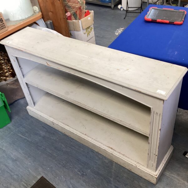 Grey painted pine bookshelf for vintage home storage.