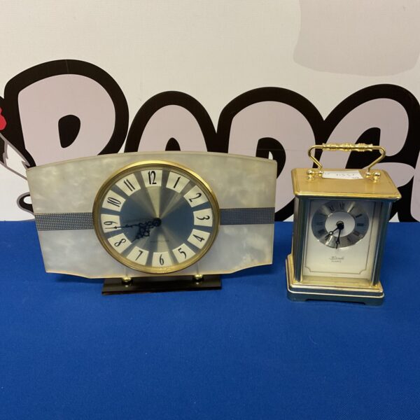 Vintage Westclox quartz mantle clock and Hermle carriage clock.