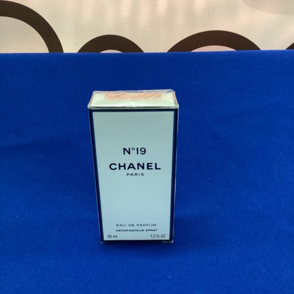 Sealed bottle of Chanel No 19 perfume, vintage fragrance collector's item.