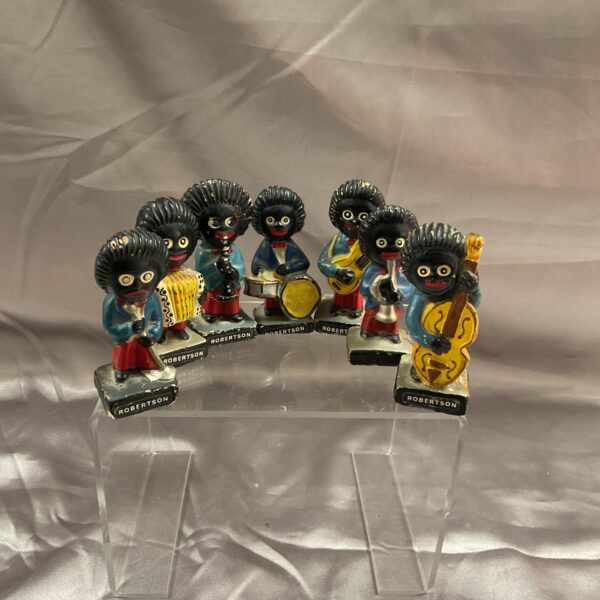 Vintage Robertson Golly Band figures playing instruments, collectible figurines.