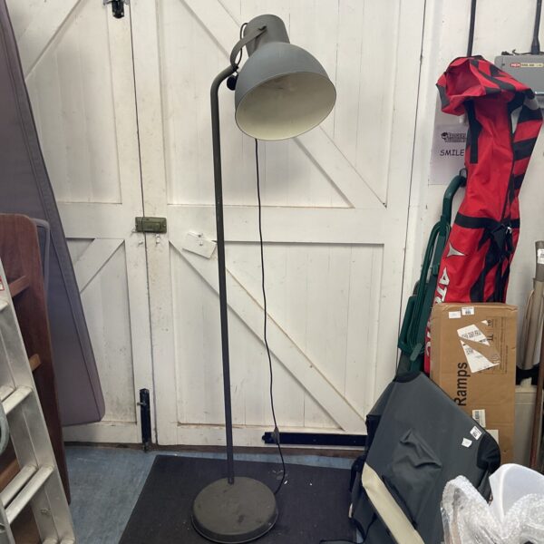 Large adjustable studio floor lamp with foot switch, industrial style lighting.