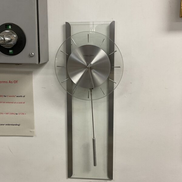 Modern quartz wall clock by London Clock Company for home decor.