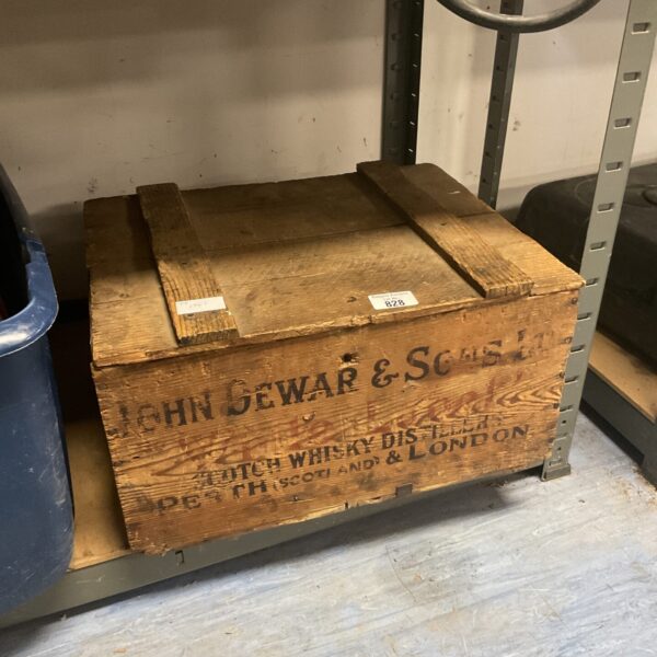 Vintage Dewar's whiskey crate with classic branding.