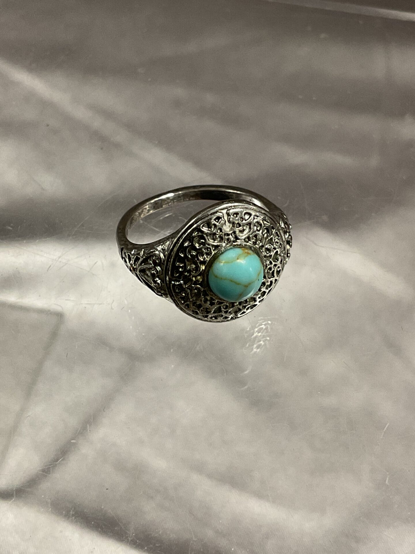 712 Silvertone ring set with turquoise stone Size M