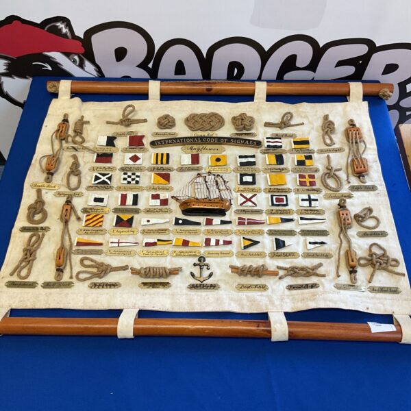 Vintage Mayflower nautical signal flag wall hanging with colourful flags.