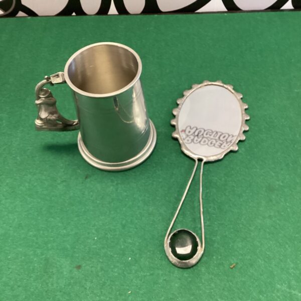 Vintage pewter tankard with green glass bead vanity mirror.