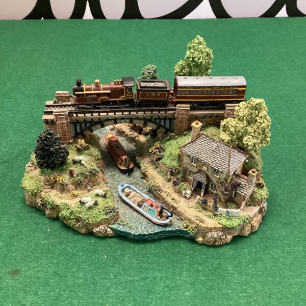 Detailed Danbury Mint river crossing diorama by Jane Hart.