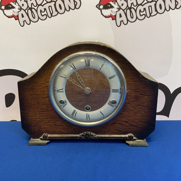Vintage Bentima Perivale mantle clock with Westminster chime displayed.