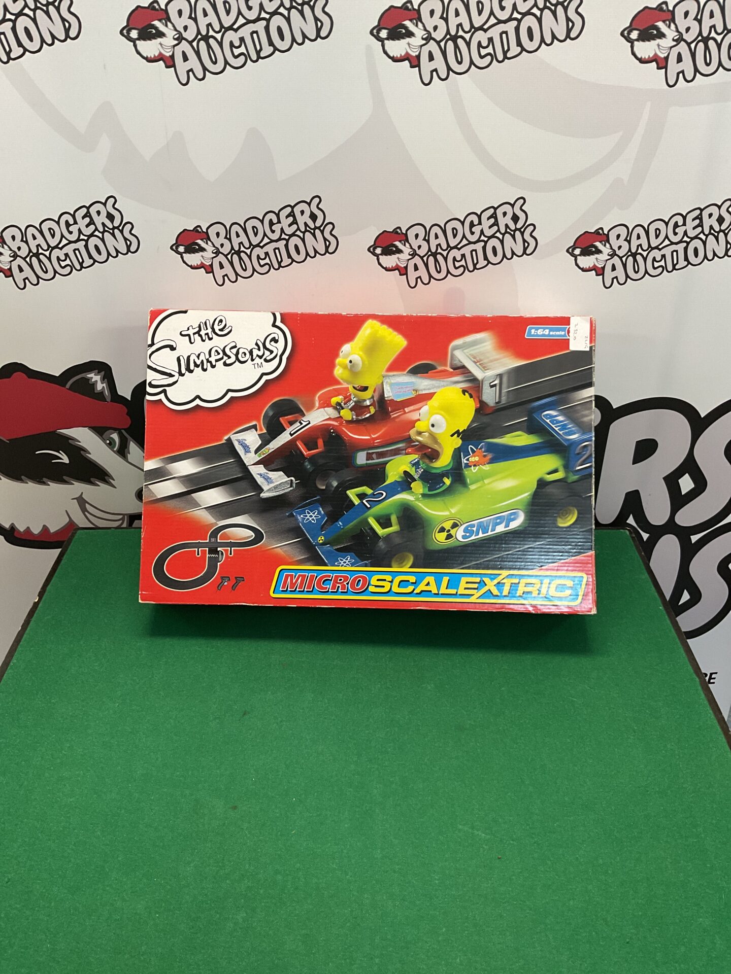 418 The simpsons micro scalextric race car set