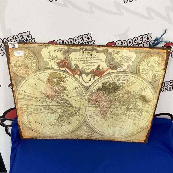 Detailed vintage world map metal plaque for wall display.
