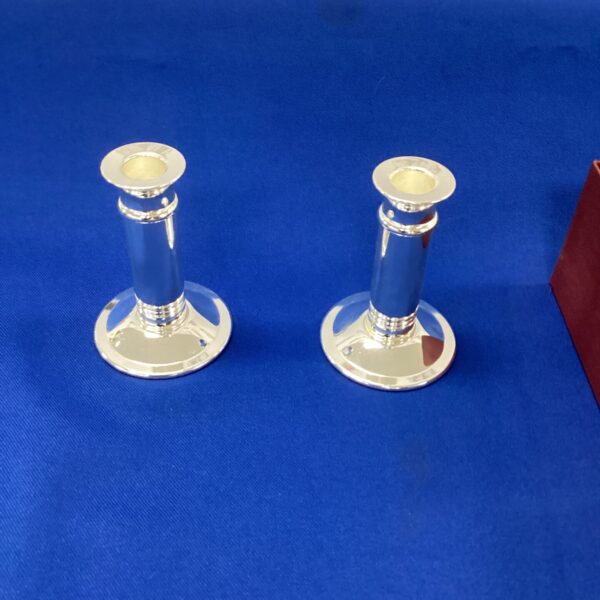 Vintage silverplate candlesticks, elegant pair for home decor.