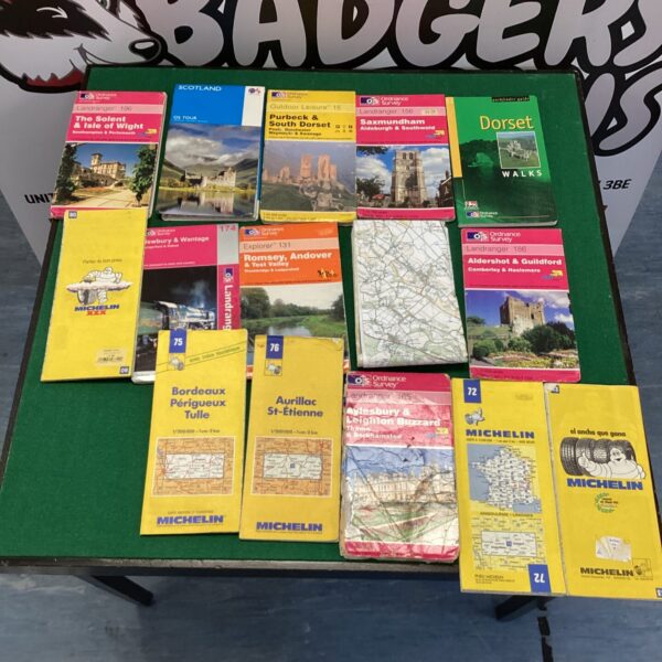 Collection of Ordnance Survey maps and walk guides for UK outdoor adventures.