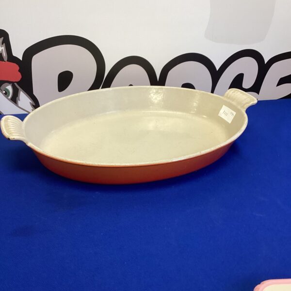 Le Creuset flan dish, ceramic baking dish for desserts.