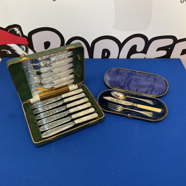 Boxed vintage silver plated cutlery set for dining.