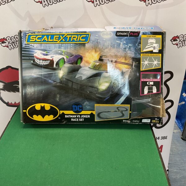 Scalextric Batman vs Joker race set in box, collectible toy.