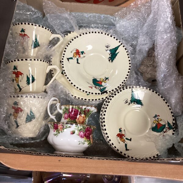Vintage Meakin Sunshine tea set with Royal Albert pieces displayed.