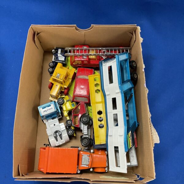 Vintage Lensley diecast cars and trucks in a lot.