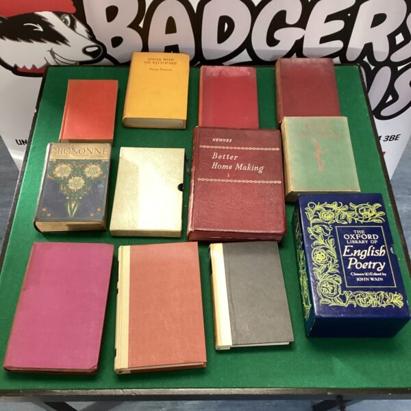 Vintage mixed book lot including poetry and home making guides.