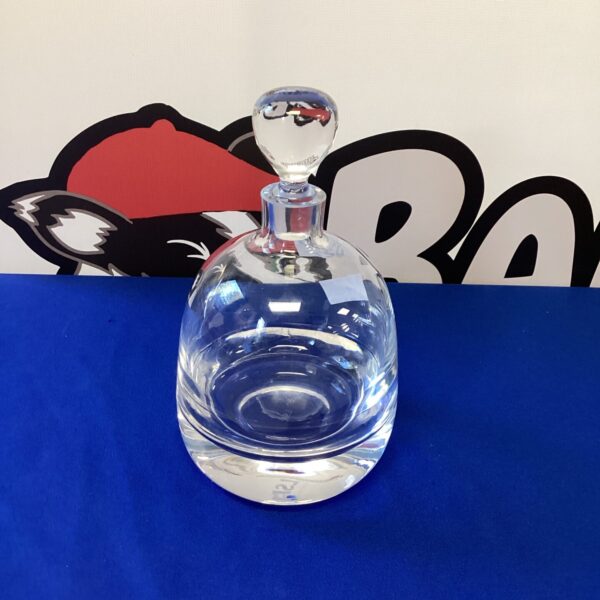 Elegant handmade crystal decanter for serving liquor.