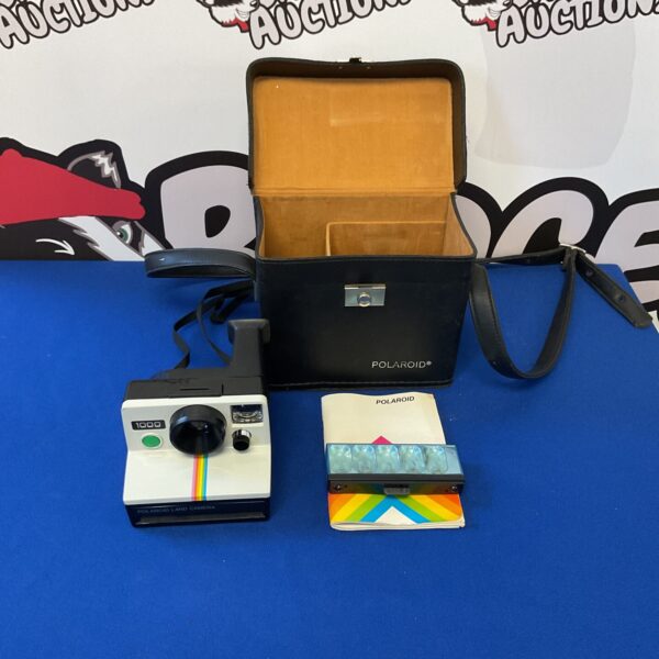 Vintage Polaroid Land Camera 1000 with case and accessories.
