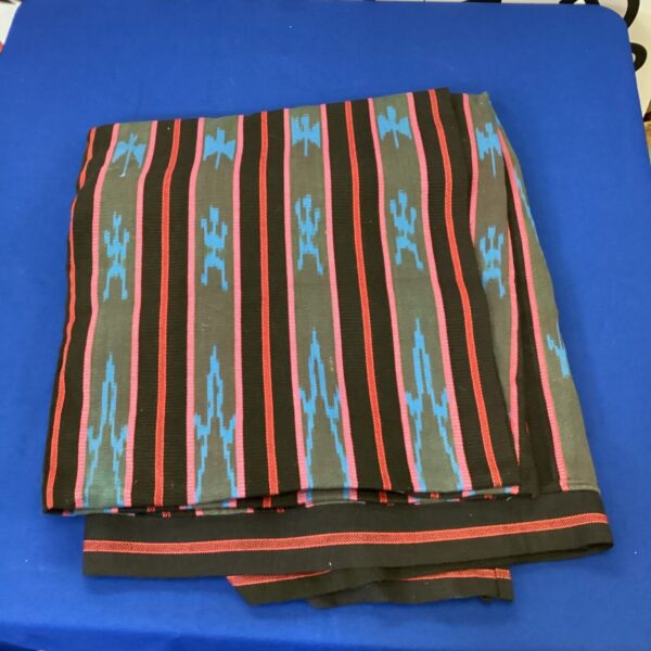 Striking Navajo blanket with bold striped pattern and vibrant colours.