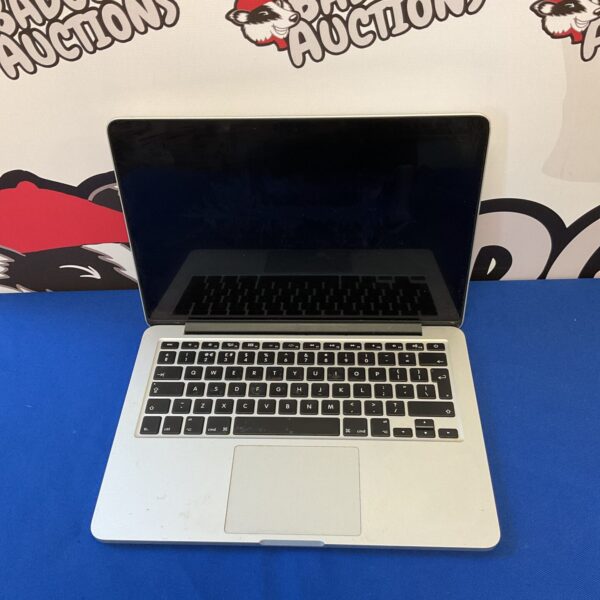 Silver Apple Macbook Pro A1502 laptop for parts or repair.