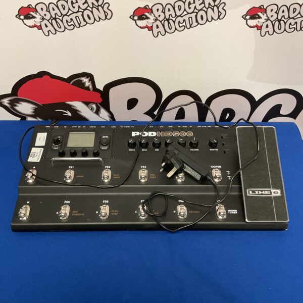 Line 6 Pod HD500 guitar effects pedal with power supply.