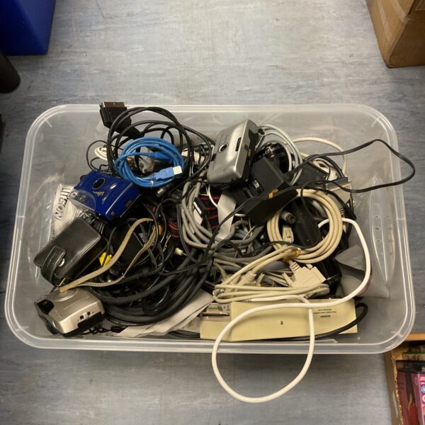 Mixed lot of cables and power supplies for electronics and computers.