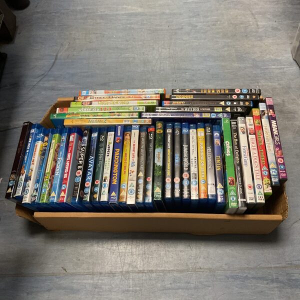 Tray of children’s DVDs and Blu-rays, including Disney films.