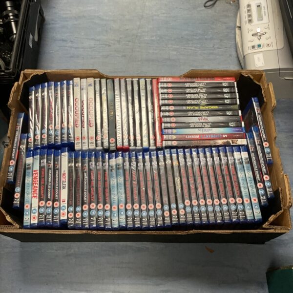 Sealed DVD and Blu-ray lot for movie collectors and enthusiasts.
