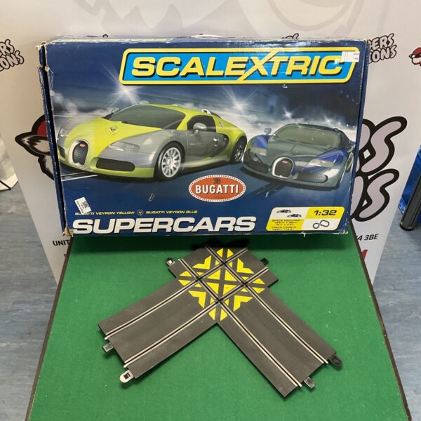 Scalextric Bugatti Veyron racing car on display.