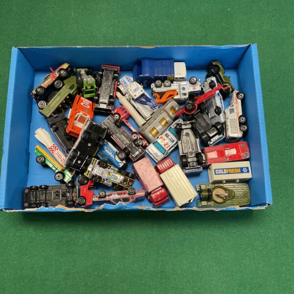 Vintage Corgi diecast model collection in a box.
