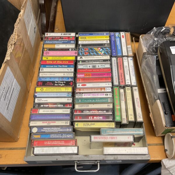 Mixed lot of vintage cassette tapes for retro music collectors.