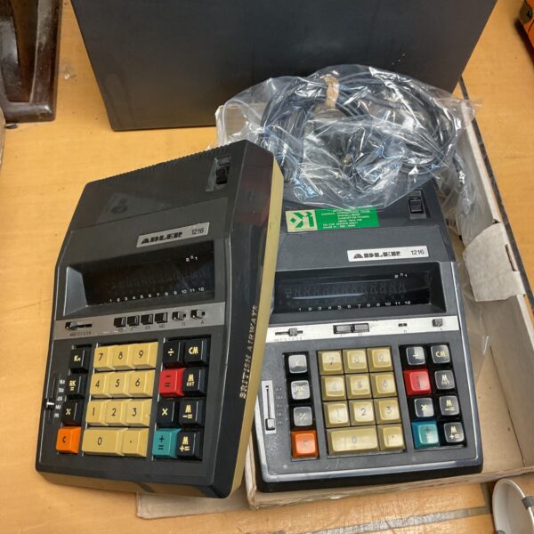 Vintage British Airways Adler 1216 calculator, a collectible airline item.
