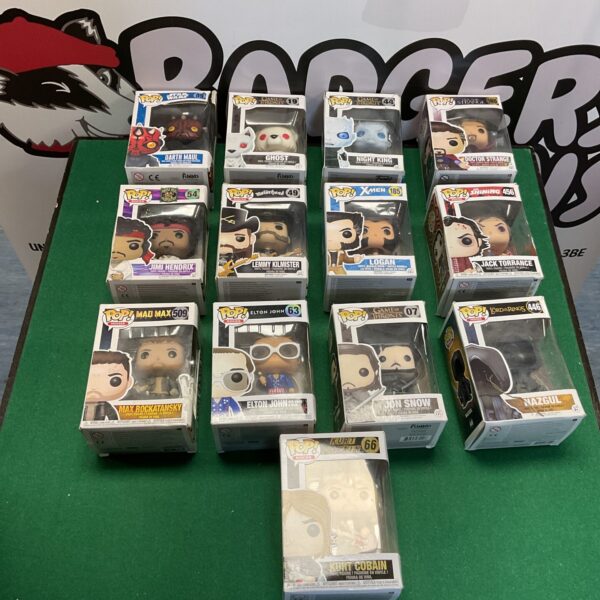 Mixed Funko Pop lot featuring Kurt Cobain collectible figure.