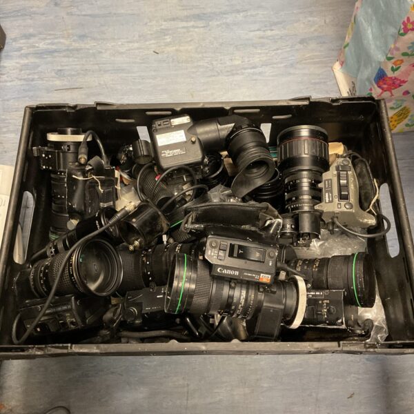 Vintage camera lens lot with Nikon and Canon lenses.
