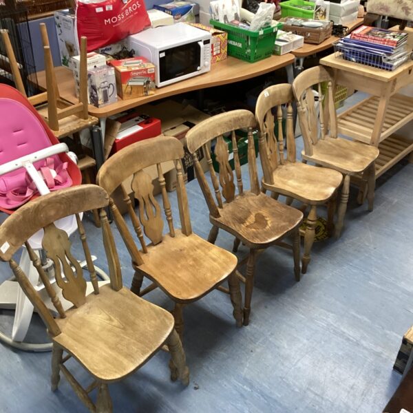 Lot of five vintage wooden kitchen chairs.