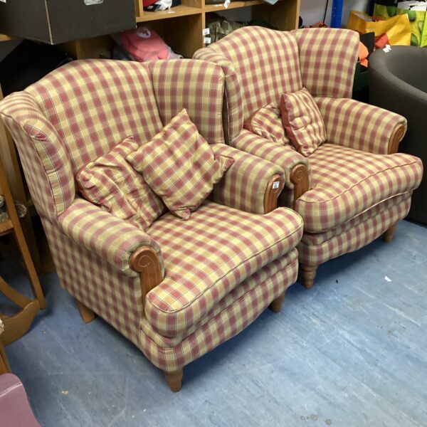 Pair of vintage gingham armchairs in a living room setting.