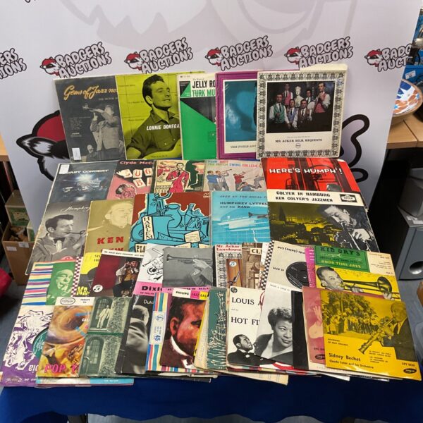 Vintage jazz vinyl record collection with colourful covers.